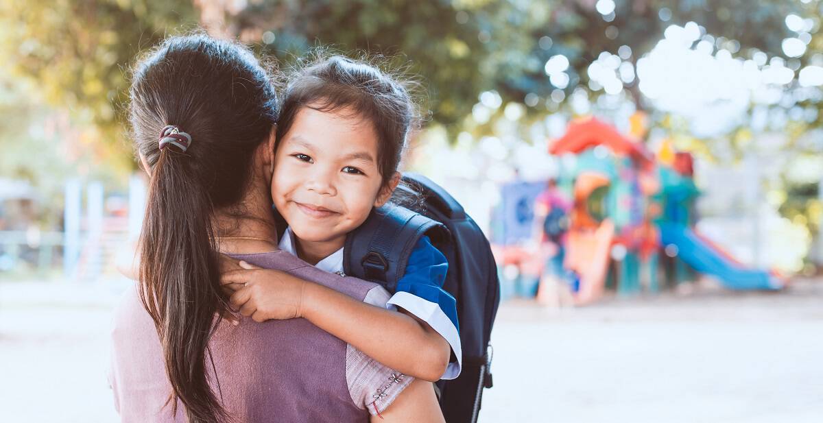 A mother holding her child