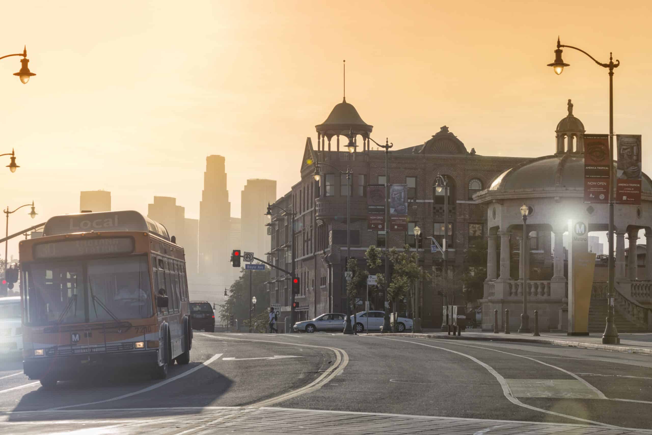A bus passes by the Boyle Hotel in Los Angeles